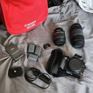 Canon EOS Digital Rebel XTI, it's black, 10.1 megapixles.